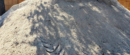 Pile of finely processed paver base showing consistent particle size distribution and uniform aggregate texture