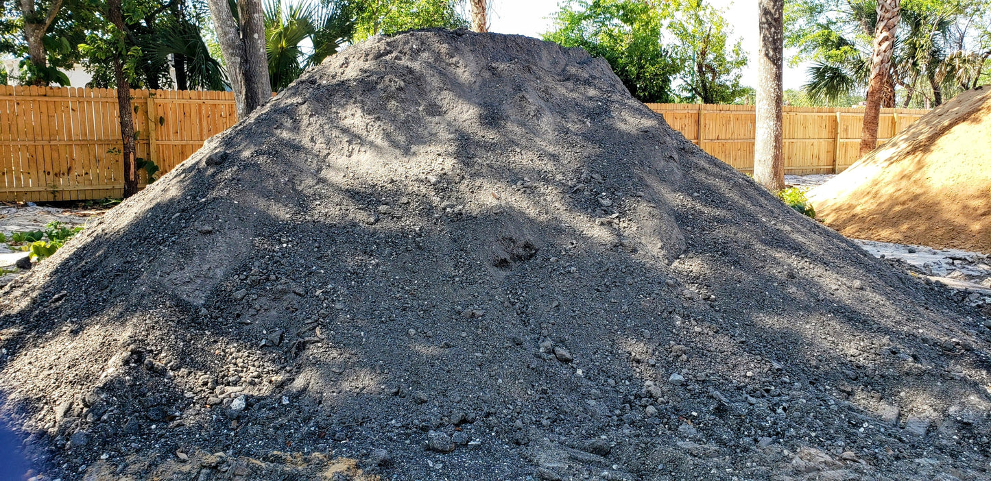 Bulk pile of recycled asphalt millings used for driveways, parking pads, and base material, clean and compactable from Mulch and Stuff in Ormond Beach, FL