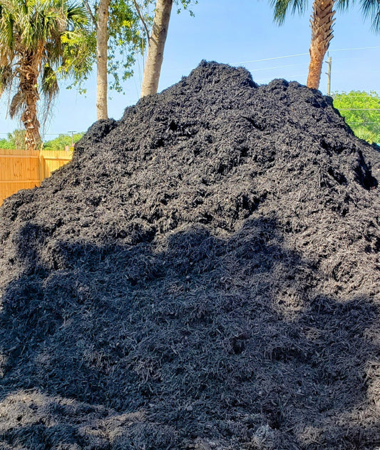 Bulk pile of Premium Black Mulch for landscaping, gardens, flower beds, and pathways from Mulch and Stuff