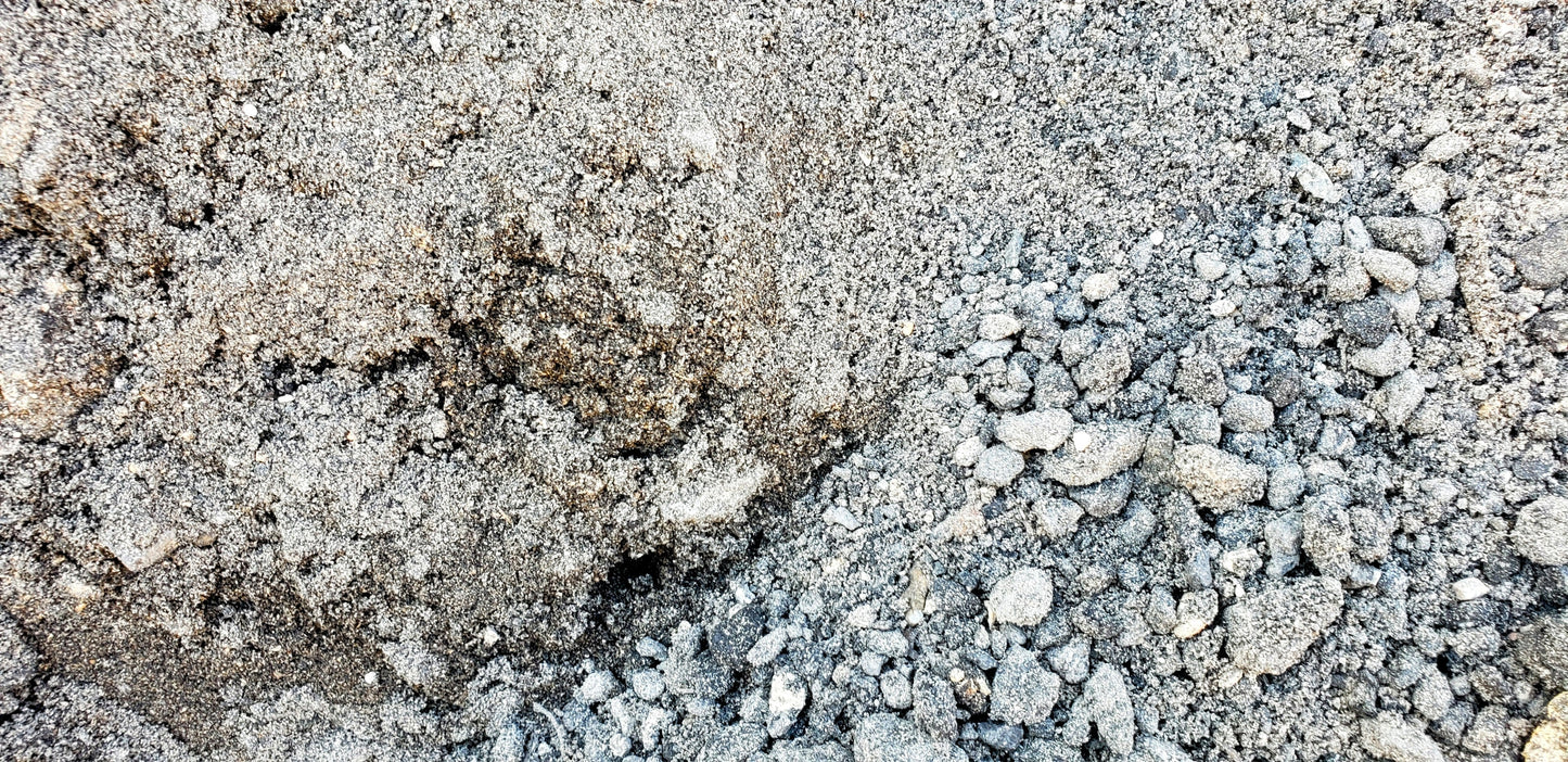 Close-up view of recycled asphalt millings showing compactable texture ideal for driveways, pathways, and base material from Mulch and Stuff