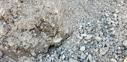Close-up view of recycled asphalt millings showing compactable texture ideal for driveways, pathways, and base material from Mulch and Stuff