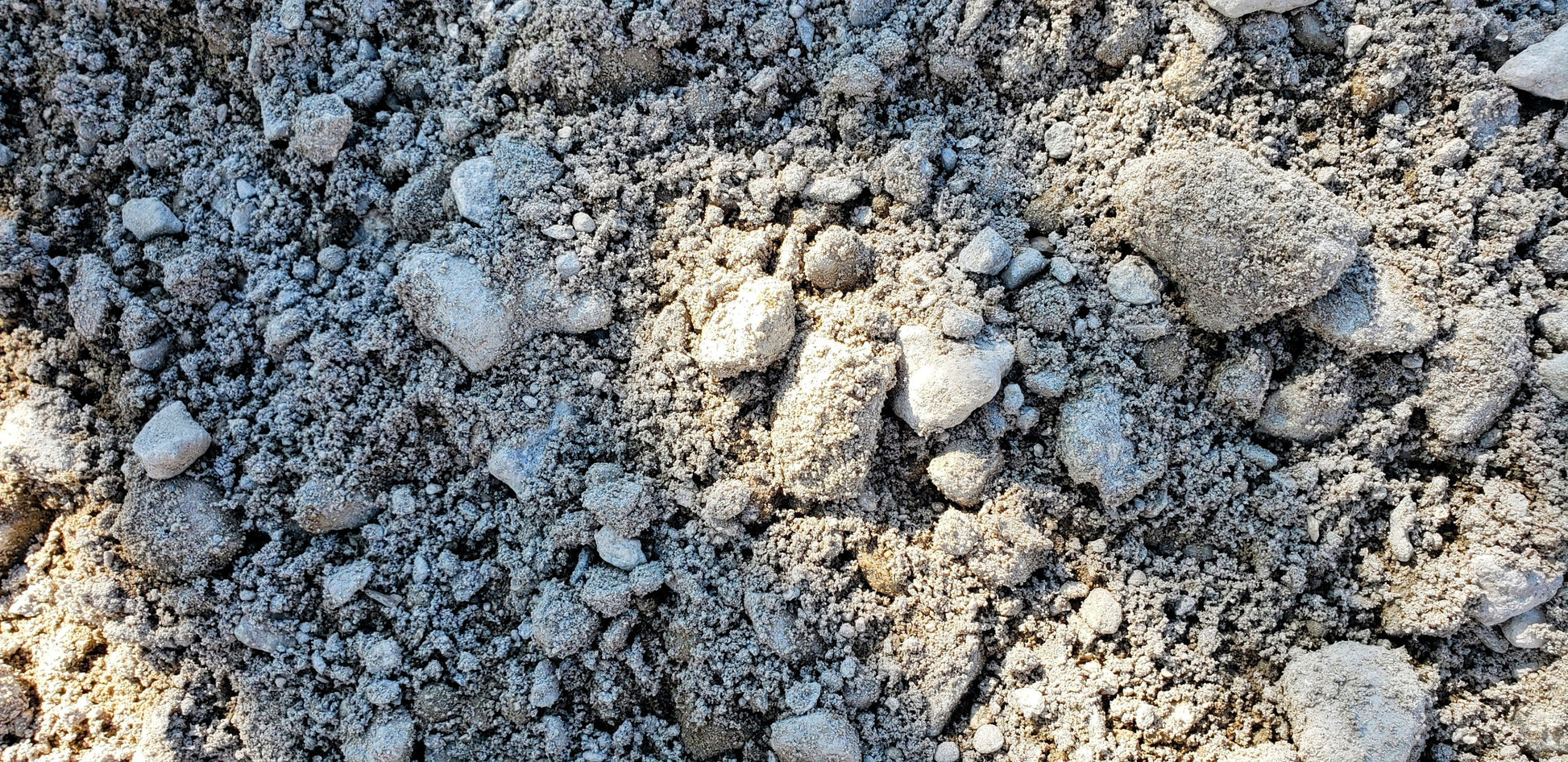 Close-up view of road base crushed concrete showing texture and aggregate mix for durable driveway and foundation use