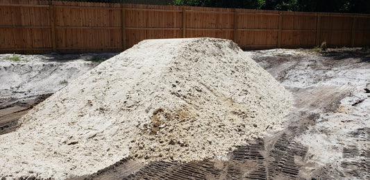 Bulk pile of clean white mason sand for construction, masonry, brick laying, and fine finishing work from Mulch and Stuff in Ormond Beach FL