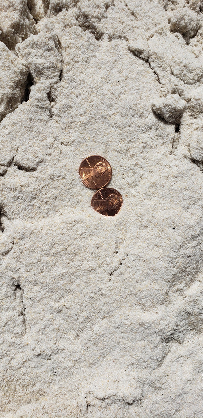 Close-up of premium white mason sand showing fine texture and smooth consistency ideal for masonry, brick work, leveling, and finishing applications